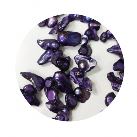 SWP7710- 1 Strang Perlen Zähne quer gebohrt ca (8-12) x (10 -16) mm Velvet, d. lila